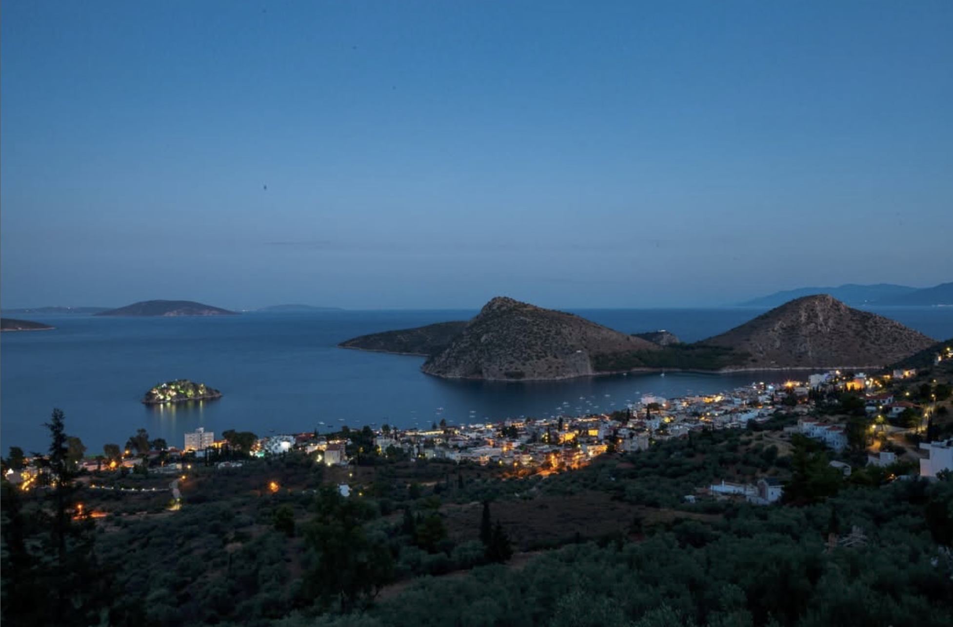 Night vista over Tolo bay with village lights
