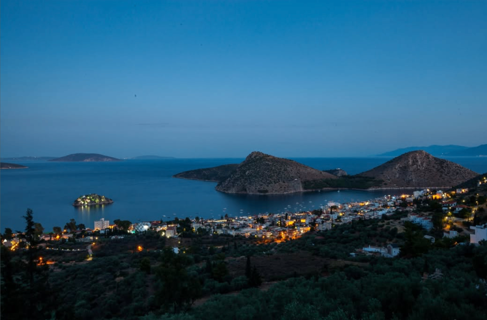 Night panorama of Tolo Bay and Romvi island